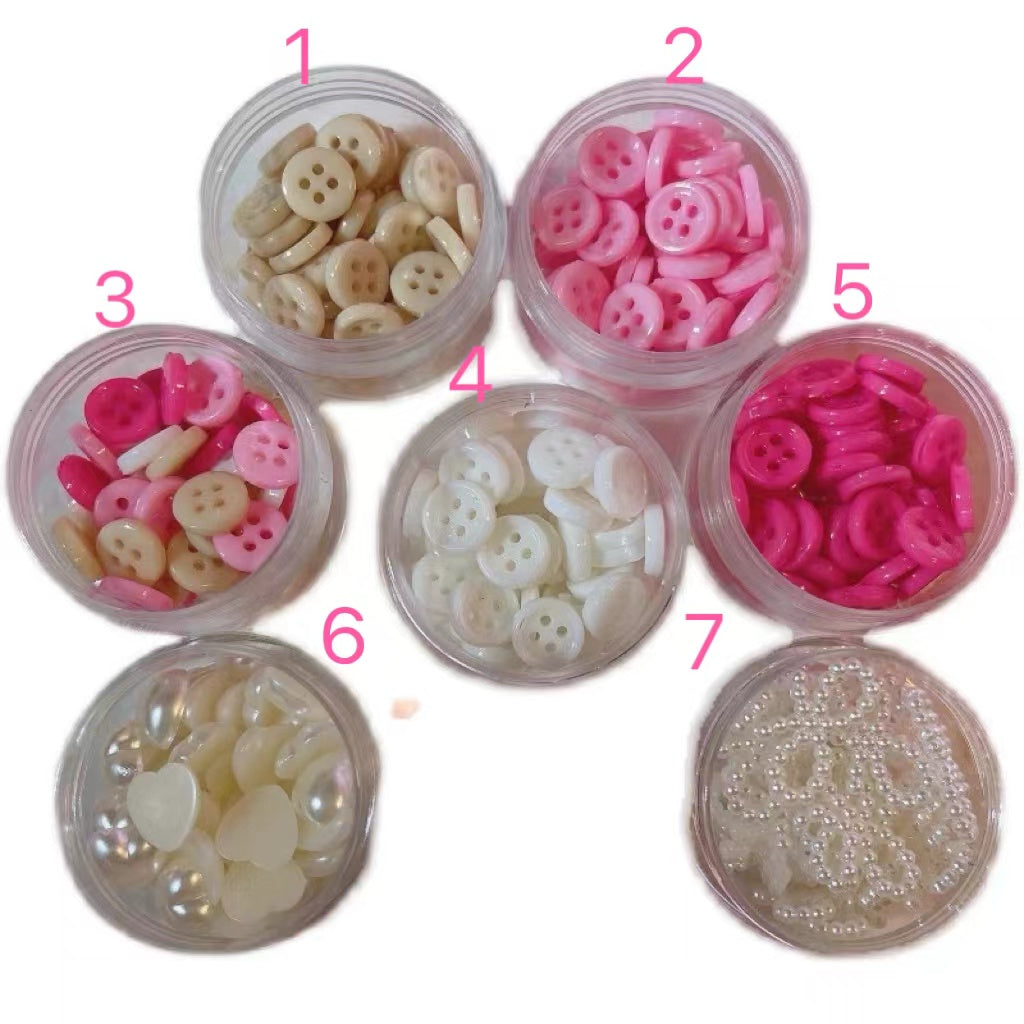 Mini button and decorated with pearl bows